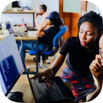 A lady training a student using a system
